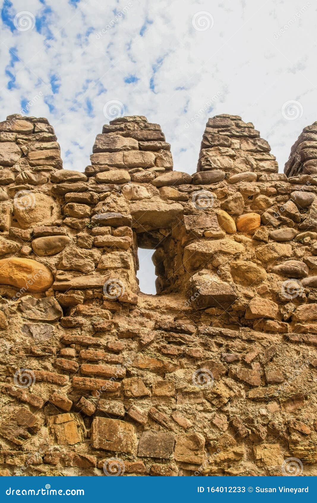 vertical view of ancient castle  battlements-protective tooth d parapets with merlons and crenels for soldiers to shoot from