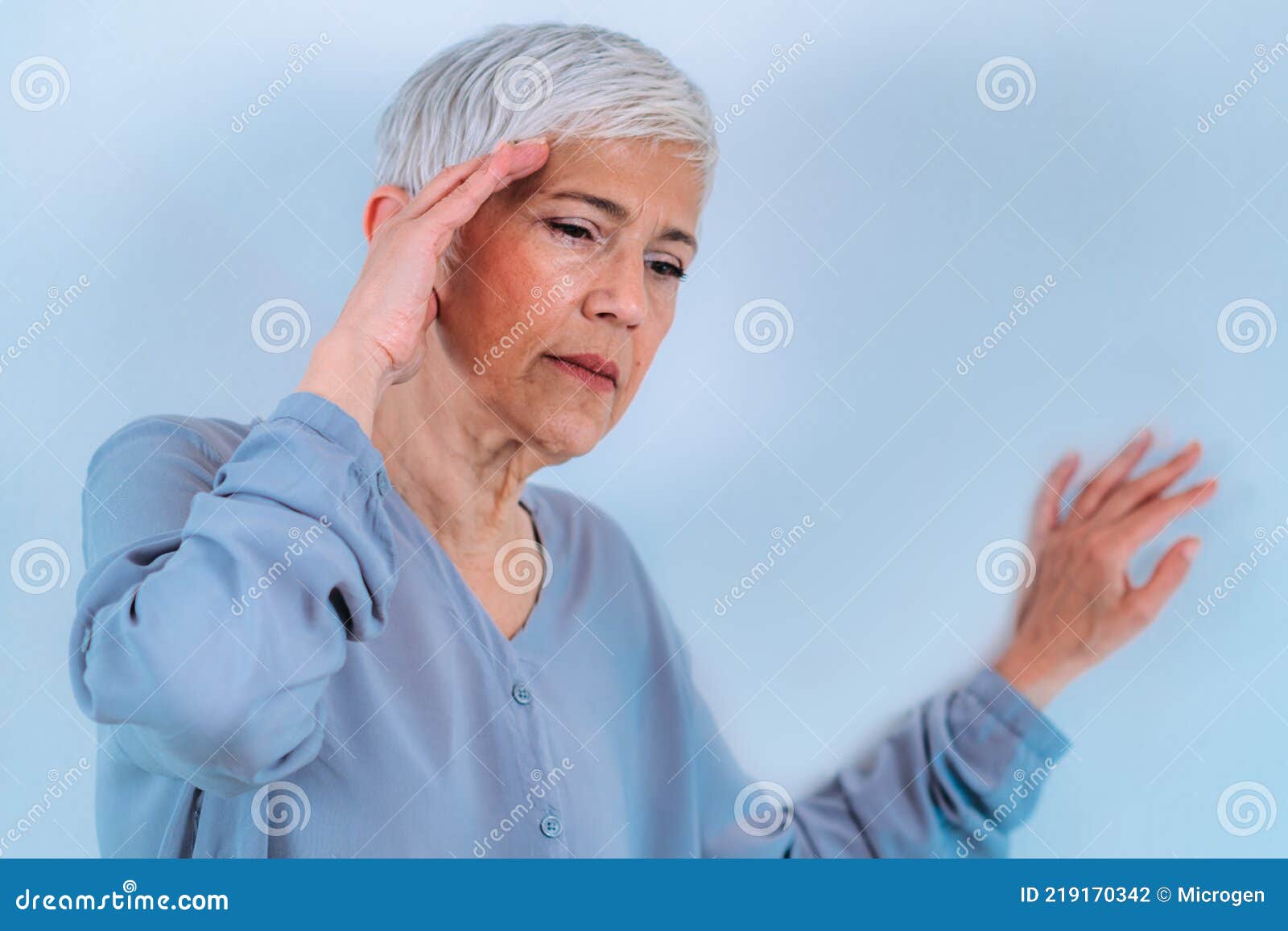 Vertigo. Senior Woman Suffering from Vertigo Dizziness Stock Photo