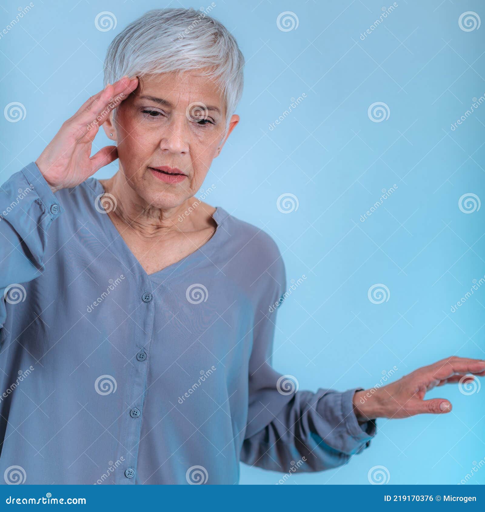 Vertigo. Senior Woman Suffering from Vertigo Dizziness Stock Photo