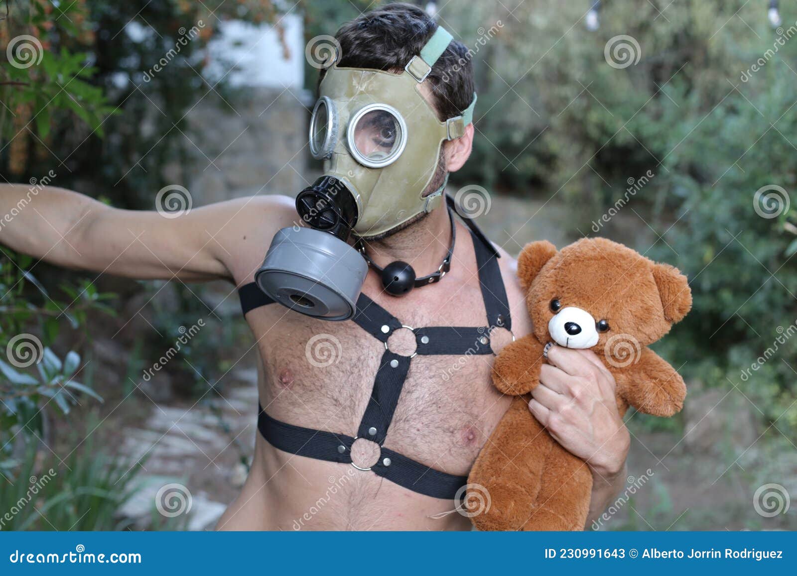 Very Man a Gas Mask and Holding a Teddy Bear Stock Image - of bdsm, dominance: 230991643