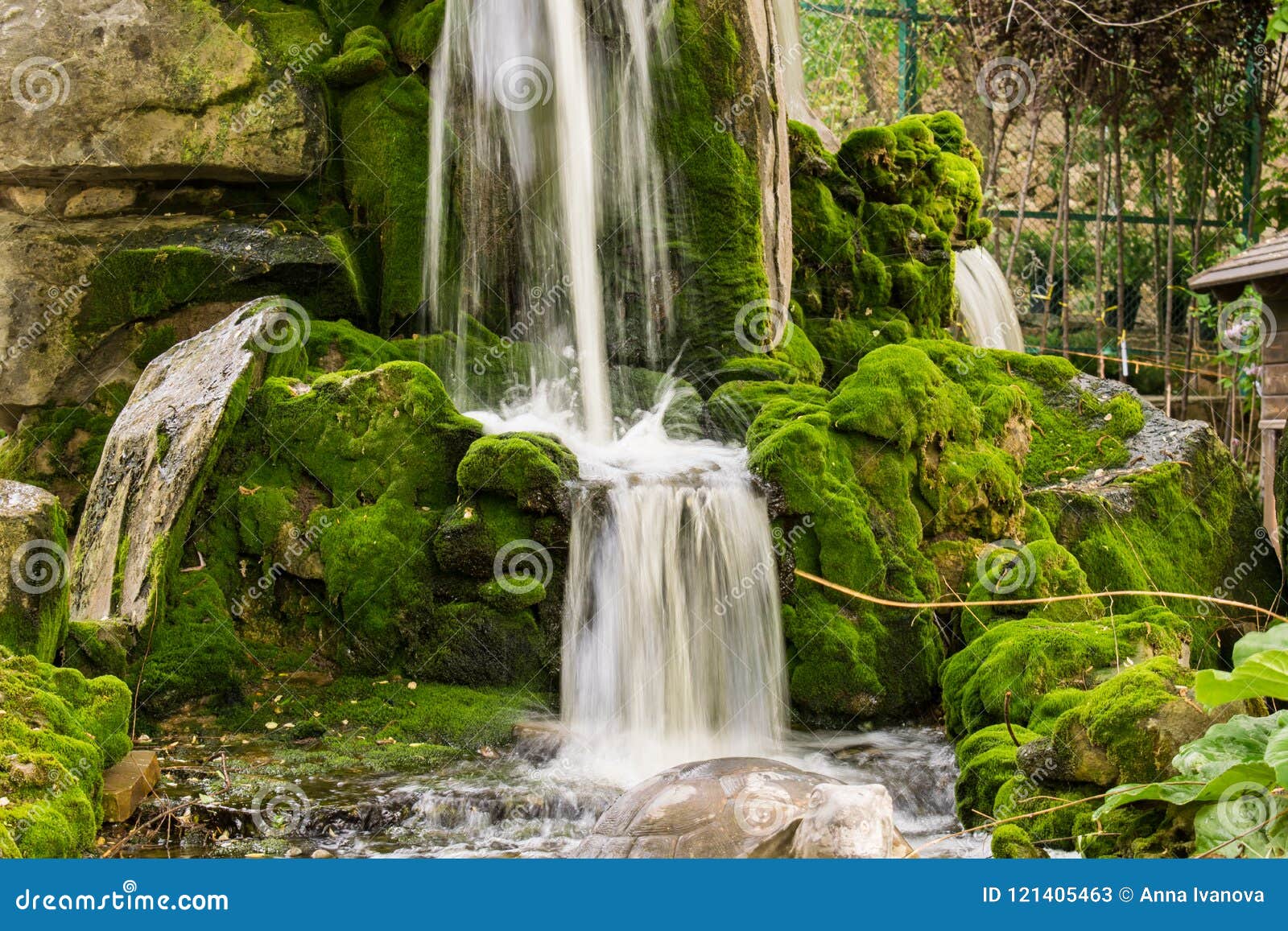 Very Beautiful Waterfalls with Living Water and Growing Moss. Water Flows from Above, Splashes and Drops Around Stock Image - Image of falls, cascade: 121405463
