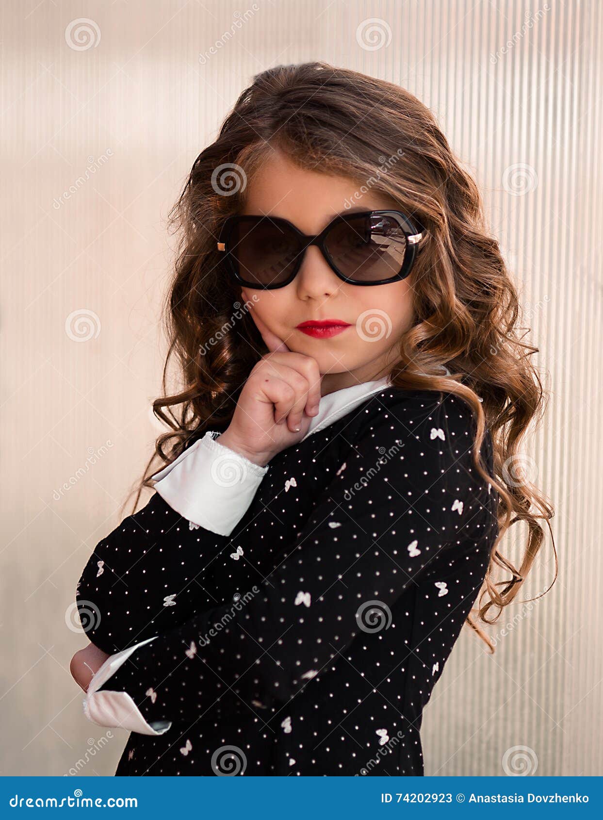 Portrait of a Stylish Fashion-dressed Beautiful Little Girl in ...