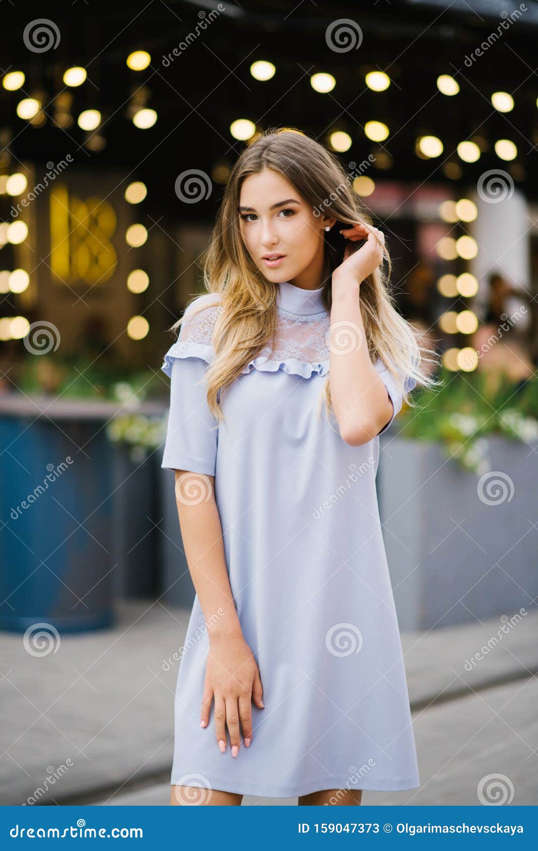 Sexy Looking Beautiful Girl In Blue Dress On Background Stock Photo,  Picture and Royalty Free Image. Image 15866915.