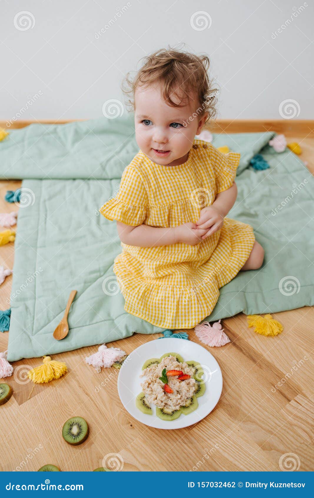 Very Cute Baby Eat Oatmeal with Kiwi Stock Photo - Image of baby ...