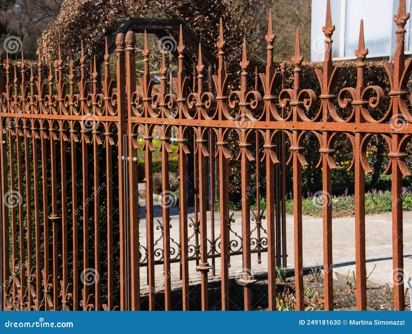 Wrought Iron Garden Fence with Rusty Patina with Spikes and Arches ...