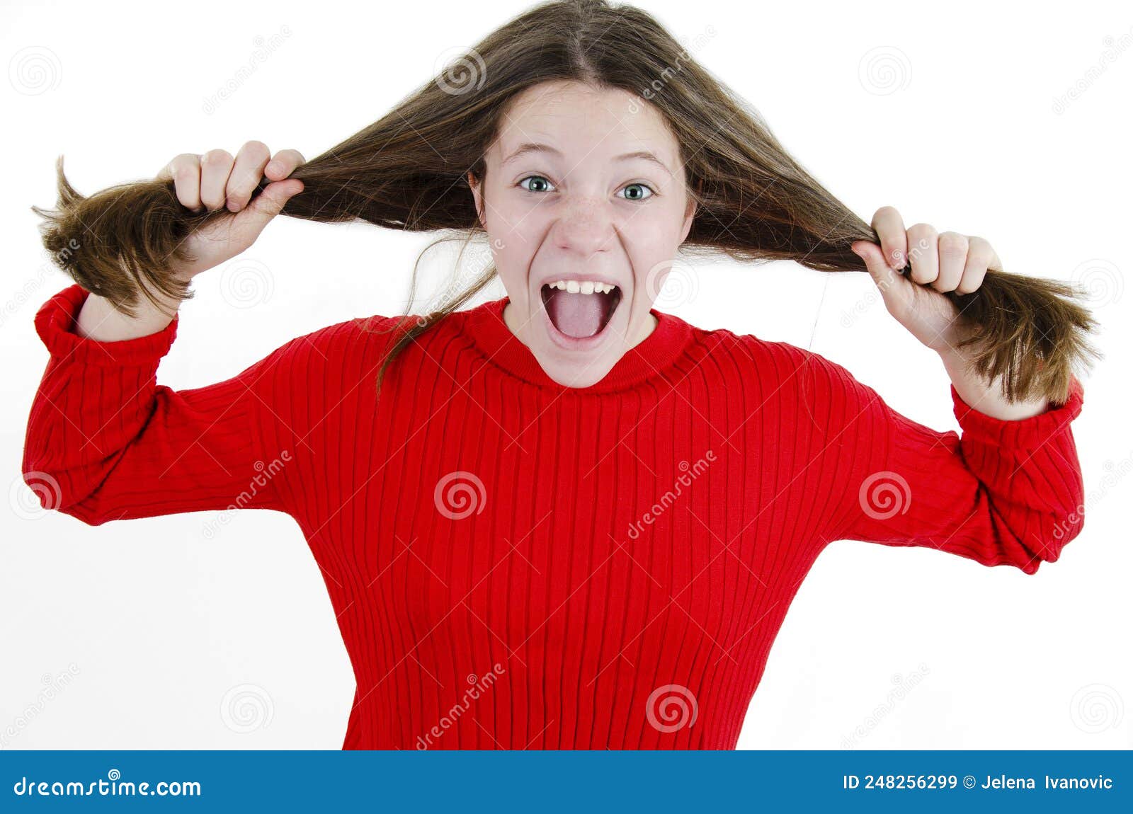A Very Frustrated And Angry And Upset Girl Is Screaming Out Loud And Pulling Her Hair Female