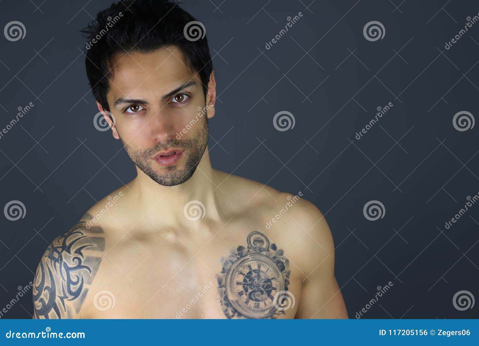 Very Handsome Man with Tattoos. Attractive Young Model Stock Photo