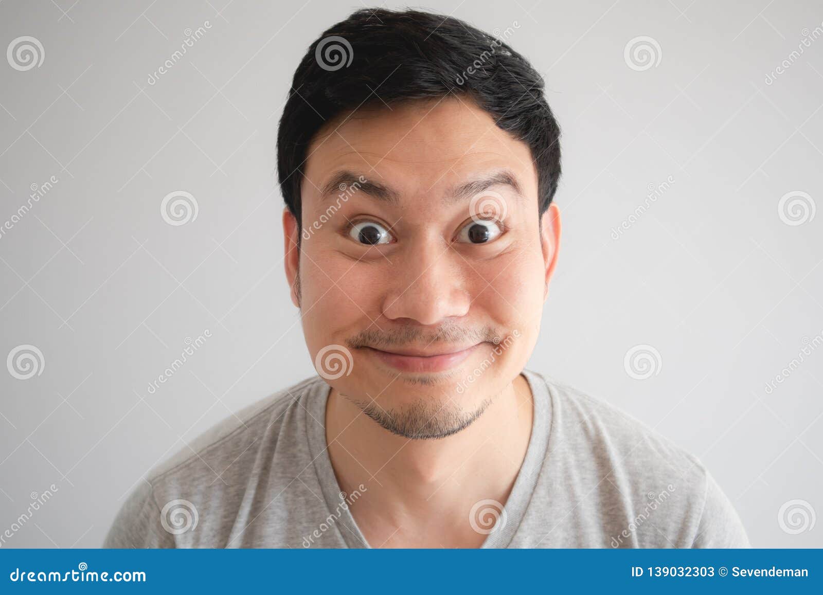 Very Happy Funny Face of Man with a Big Innocent Smile in Grey T-shirt  Stock Image - Image of expression, asia: 139032303