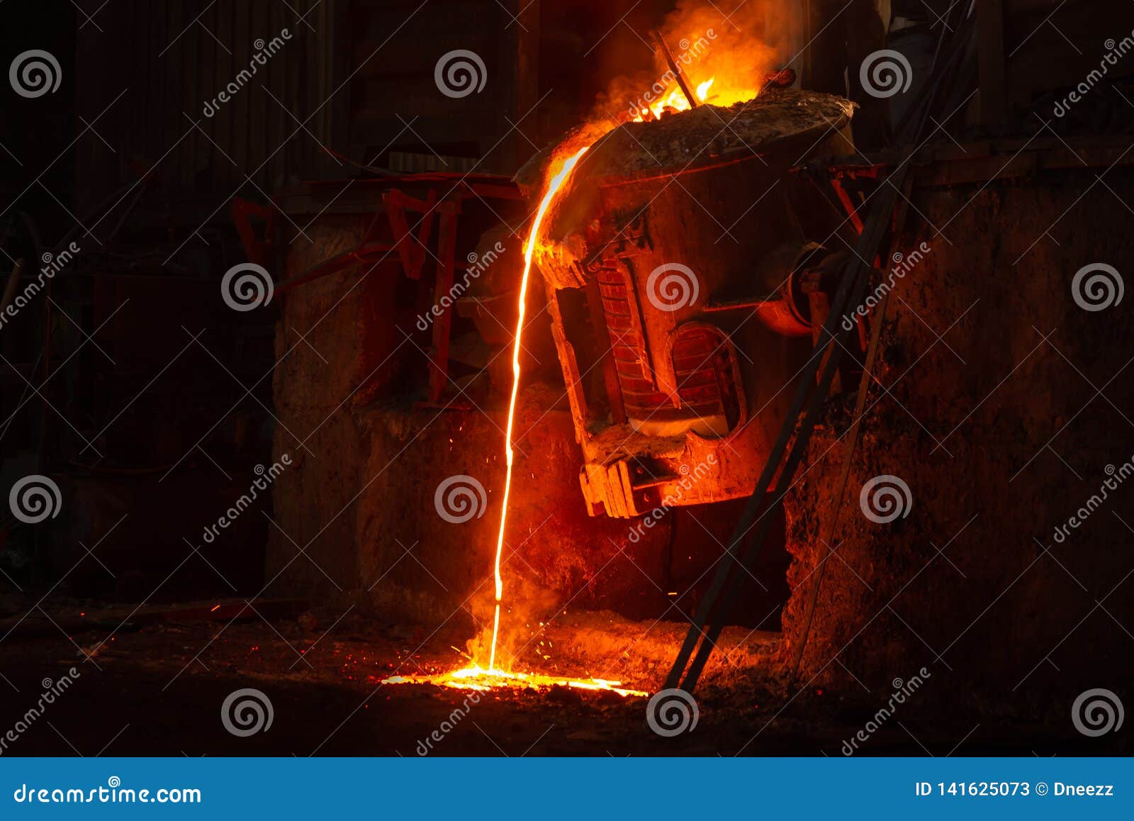 very hot metal casting in a old steel factory