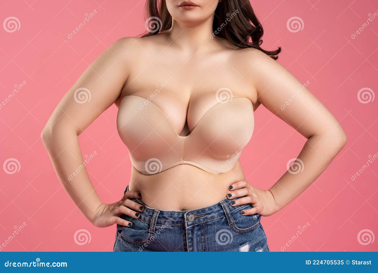 Sexy Woman With Very Large Breasts In A Push-up Bra On Pink Background,  Perfect Female Body, Studio Shot Stock Photo, Picture and Royalty Free  Image. Image 168824502.