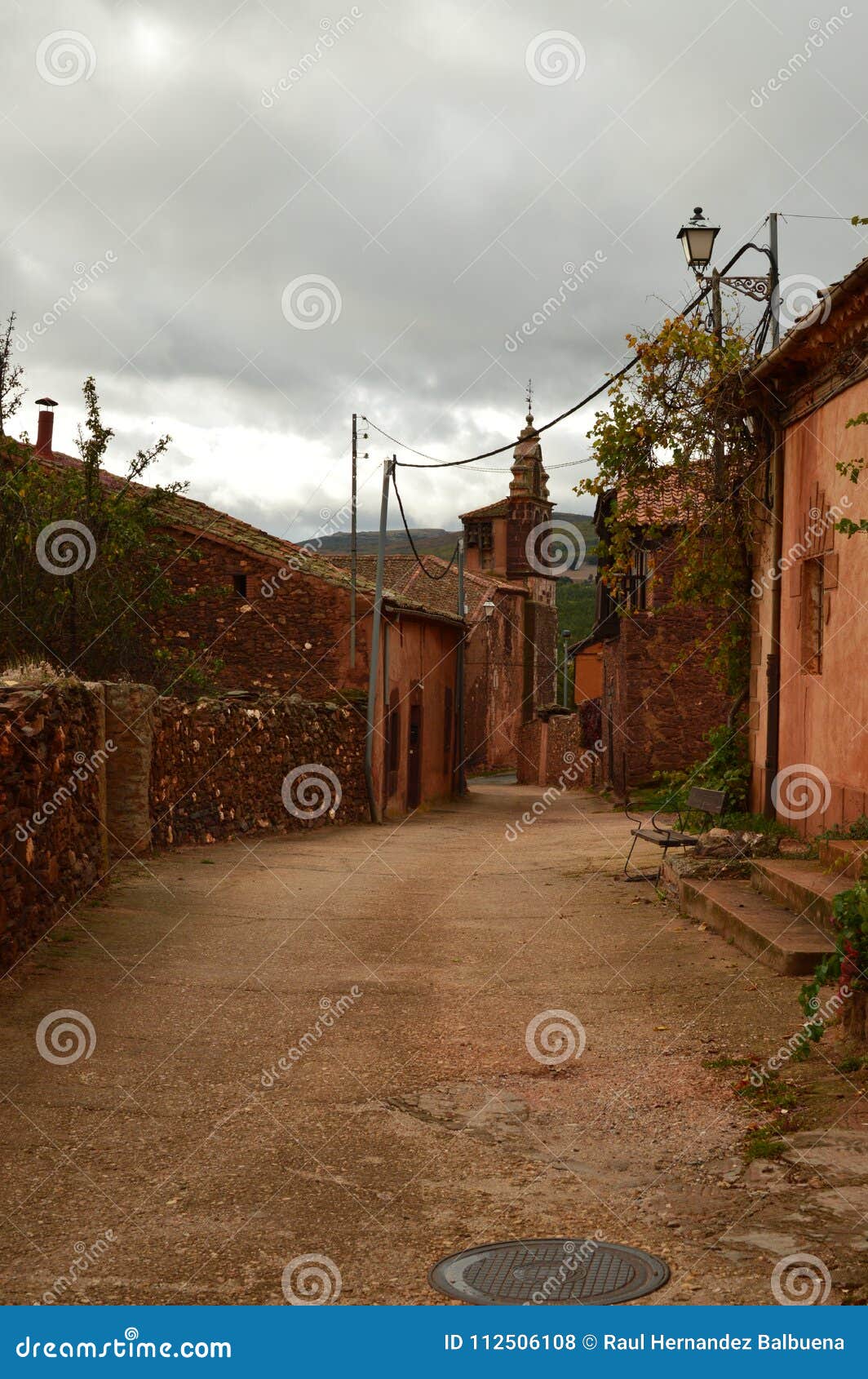 very narrow streets of a quaint village with its black slate roofs in madriguera. architecture vacation travel rural life.