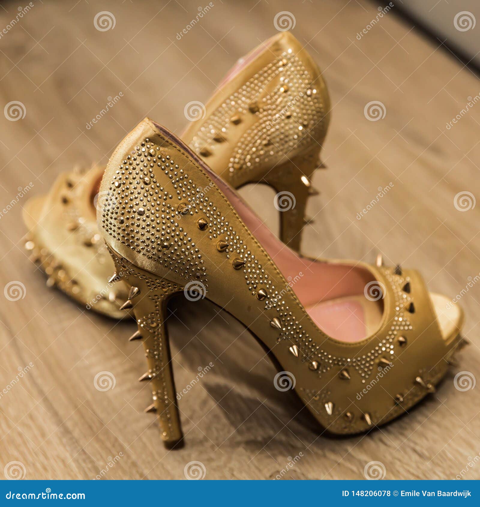 Very Original Heeled Shoes in Gold with a Decoration of Nails on a ...