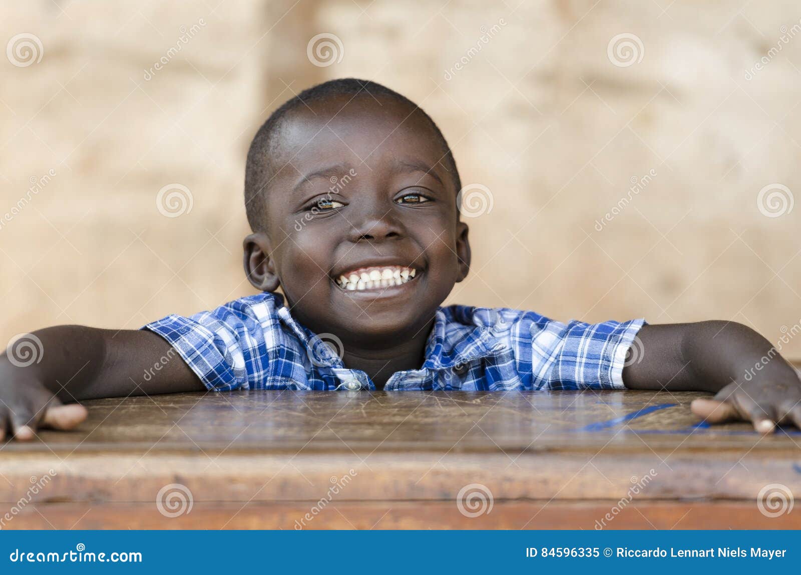 Very Proud Black African Boy Posing Under the Sun. Education Symbol