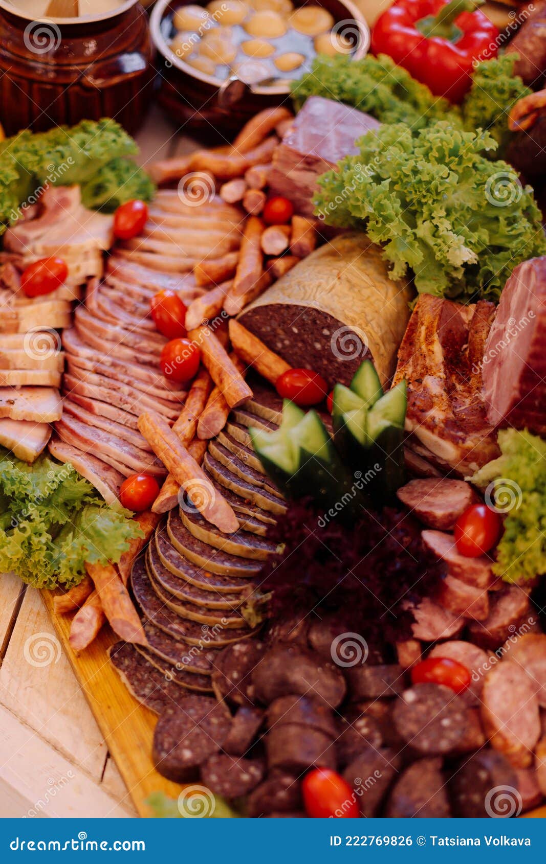 very tasty meat buffet inrustic style with herbs and vegetables. tourism and travel. traditional national cuisine. breakfast at