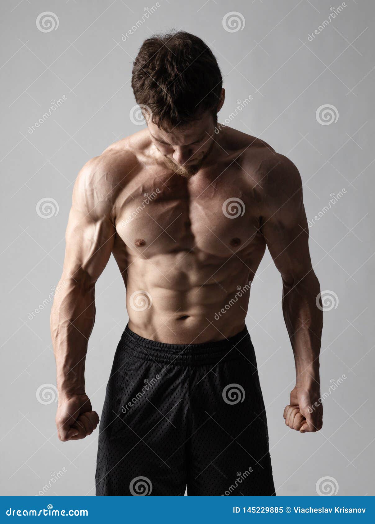 Shirtless Senior Man Gesturing Showing Body Stock Photo 