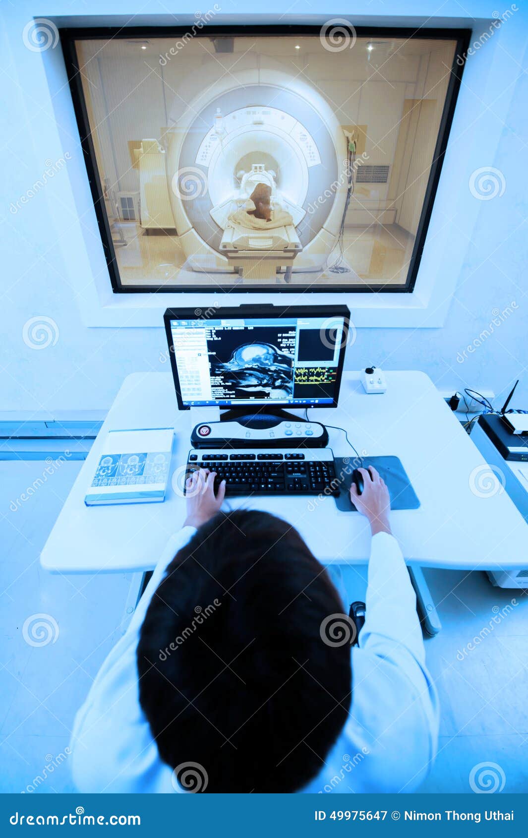 veterinarian doctor with mri computer control