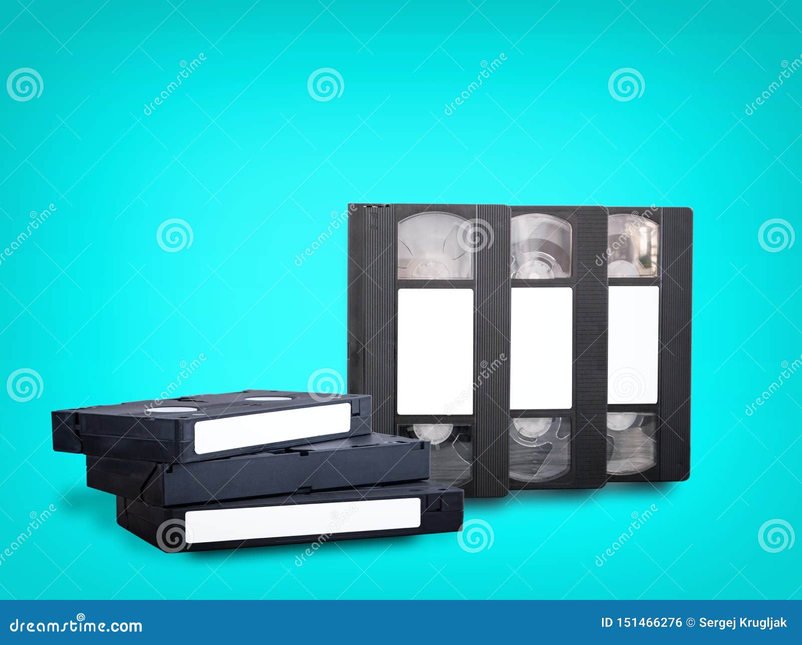 VHS Videotapes on a Blue Background Stacked Vertically and Horizontally