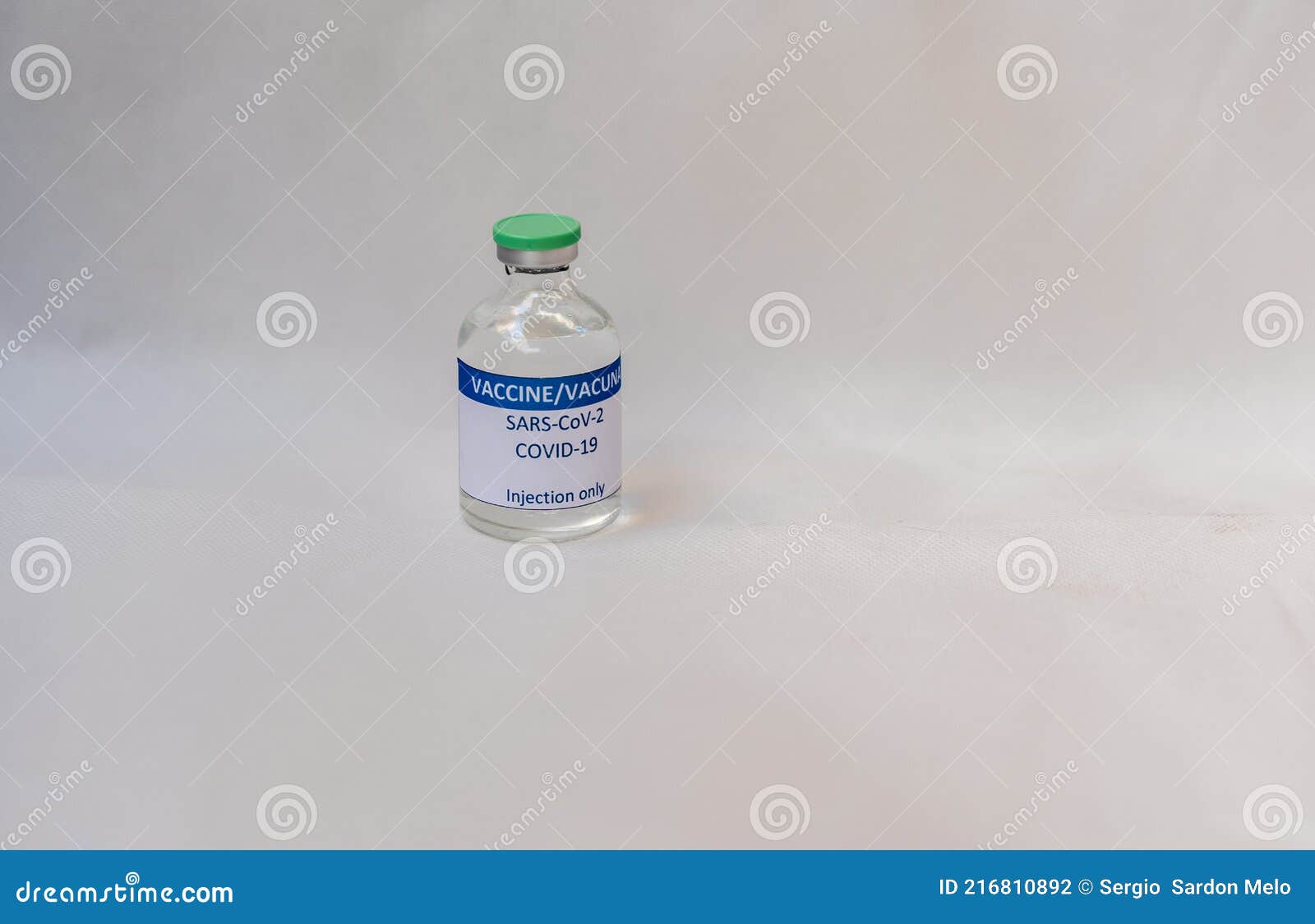 a vial with covid-19 vaccine