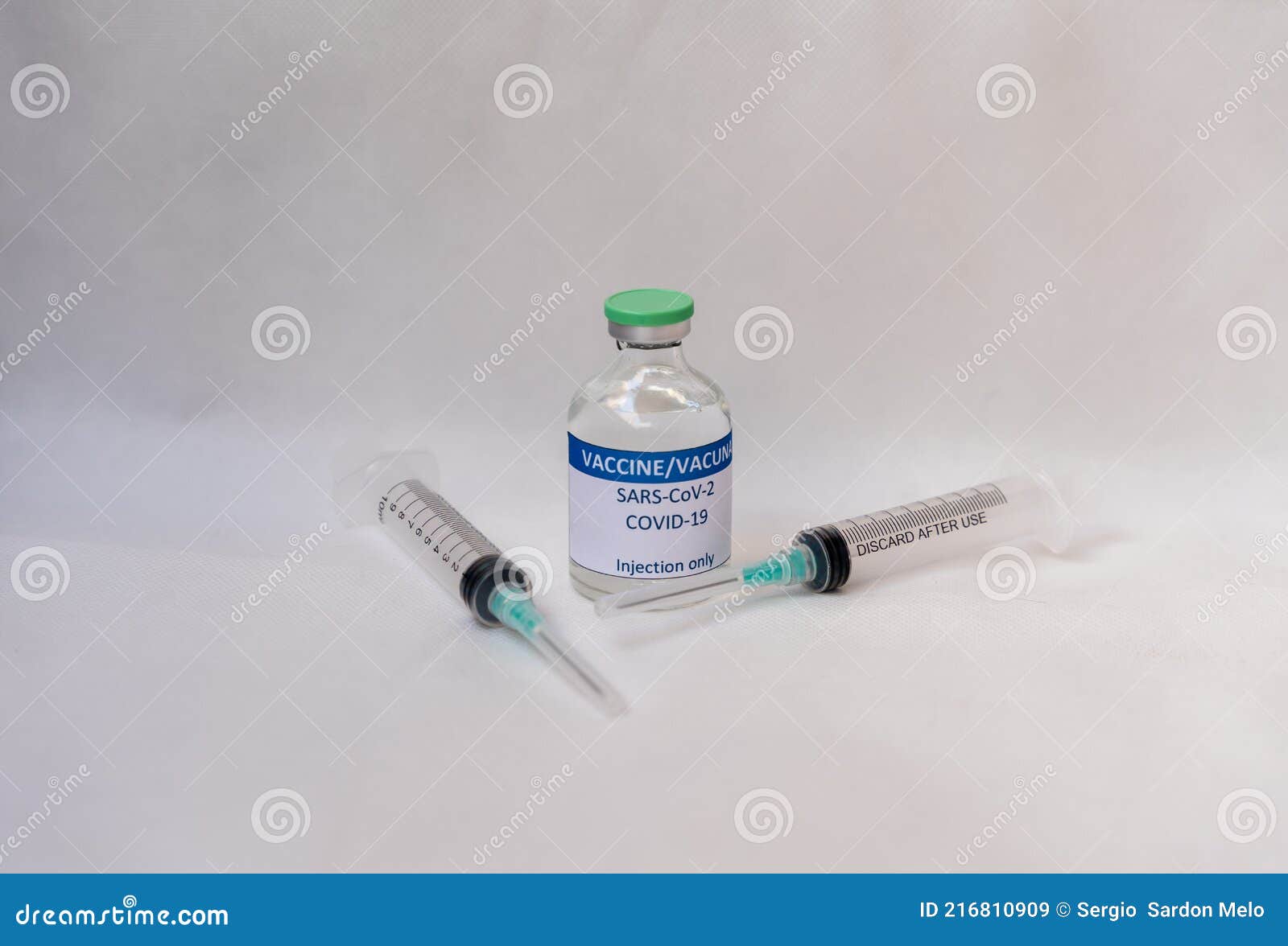 a vial with several dosis of a new developed covid-19 vaccine.