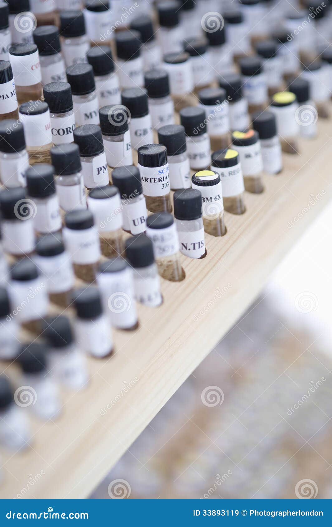 Vials in Wooden Stand stock image. Image of preserve 33893119