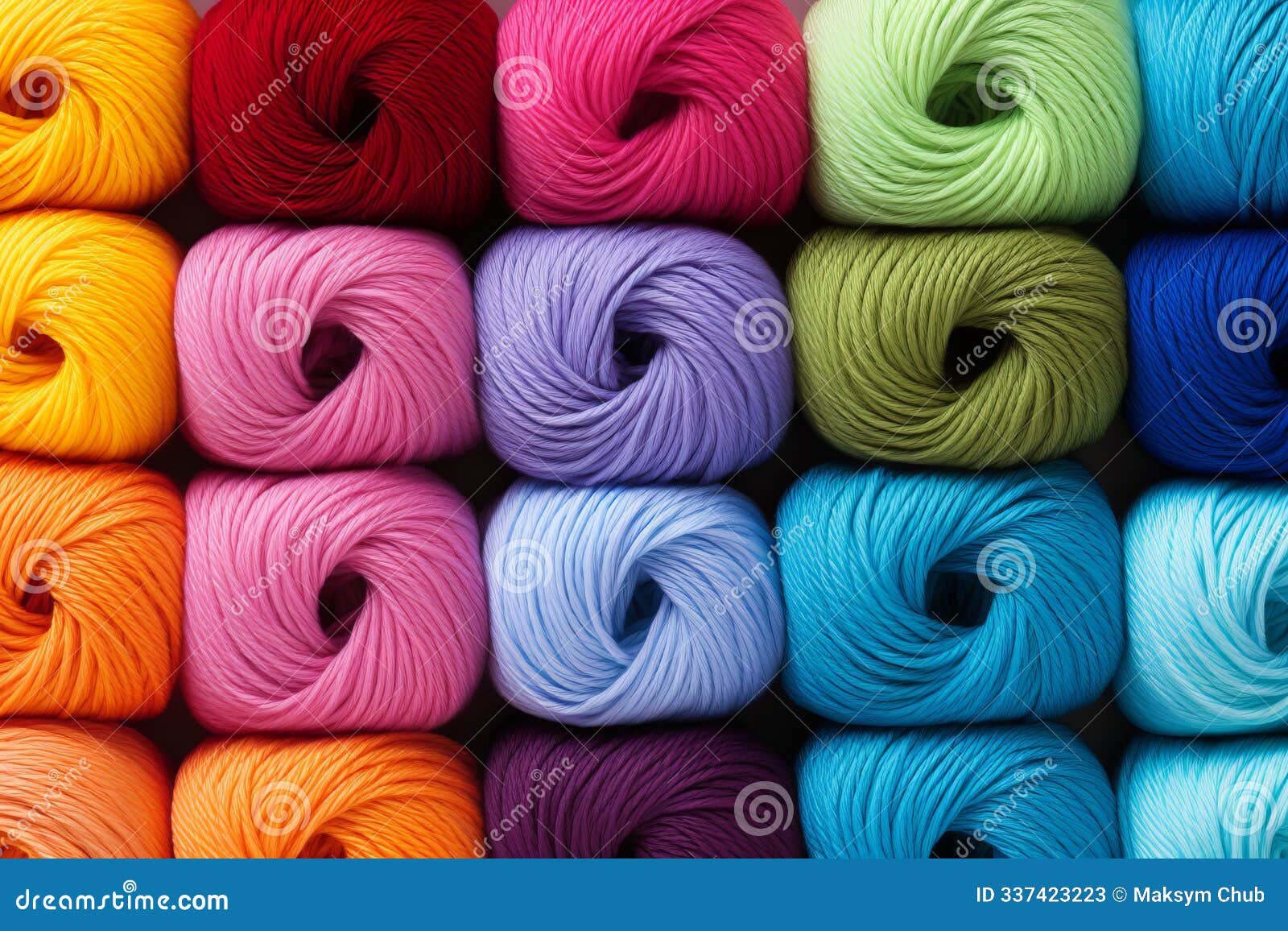 vibrant collection of colorful yarn spools arranged neatly on display in a craft store