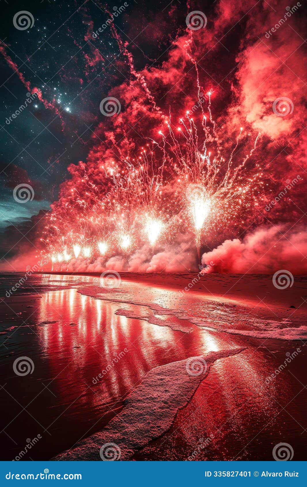 fireworks lighting up a beach at night with dramatic red reflections