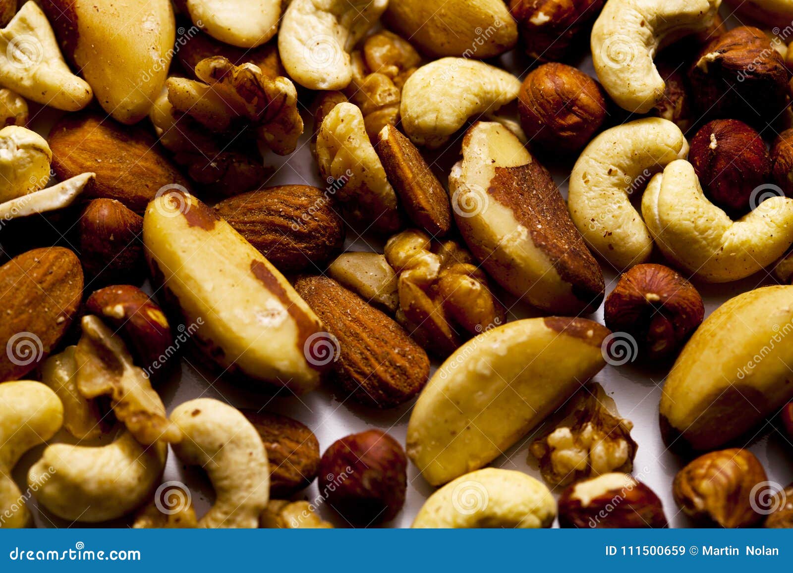 A Selection of Organic Nuts on White Surface Stock Image Image of