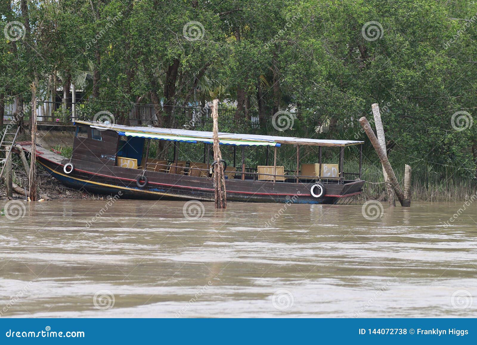 a vibrant wet boat market on the makong delta  souther part of the country where the major industry is farming
