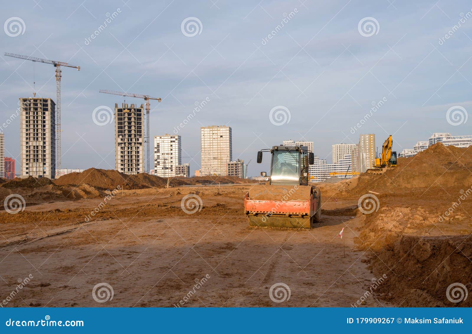 vibration single-cylinder road roller leveling the ground for the foundation. soil compactor for laying asphalt