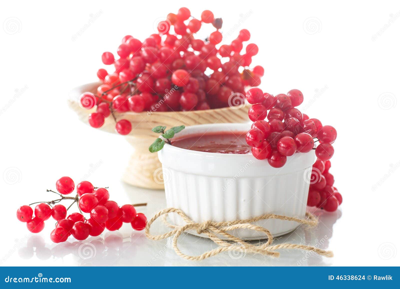Viburnum jam. Guelder rose jam with fresh sweet viburnum on a white background