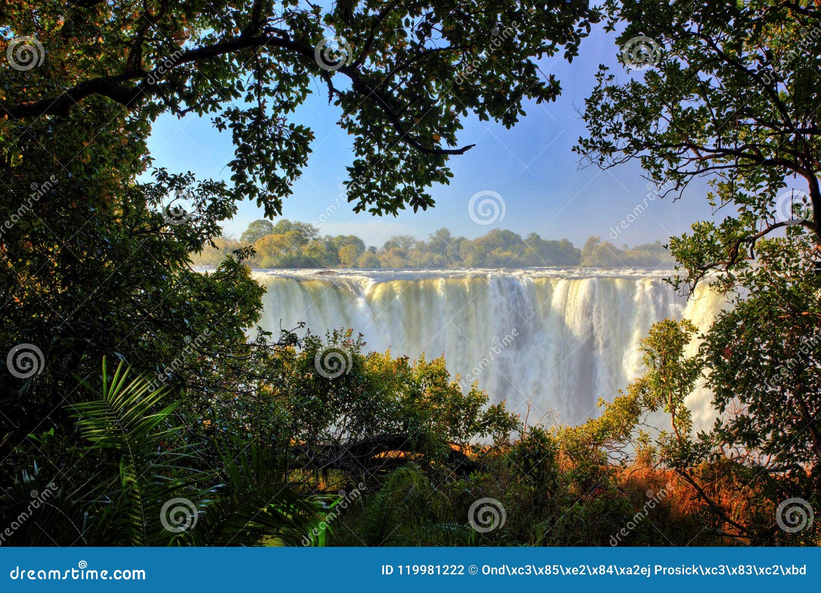 victoria falls, waterfall in southern africa on the zambezi river at the border between zambia and zimbabwe. landscape in africa.