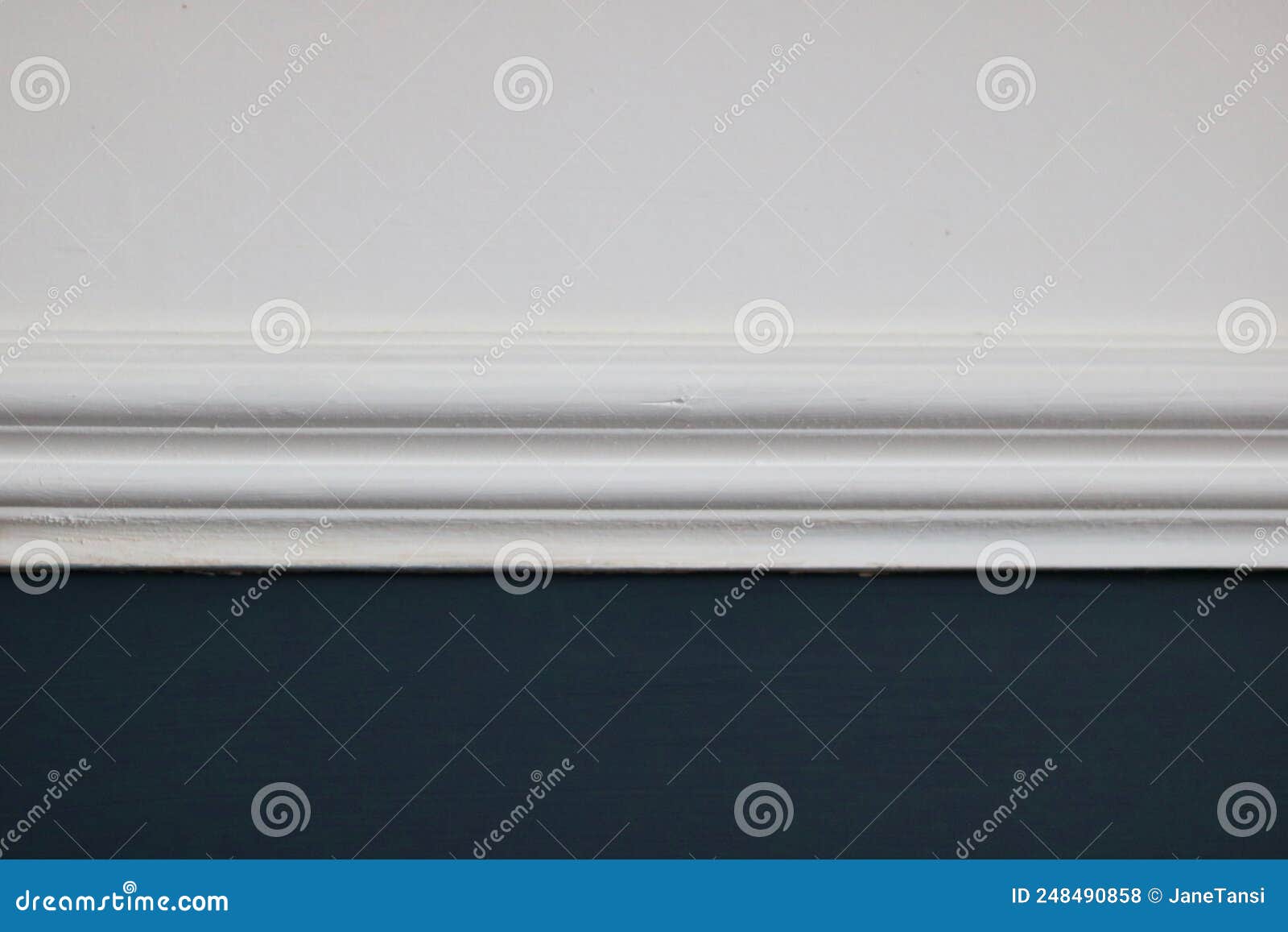 victorian  feature - dado rail painted white on white and dark teal wall