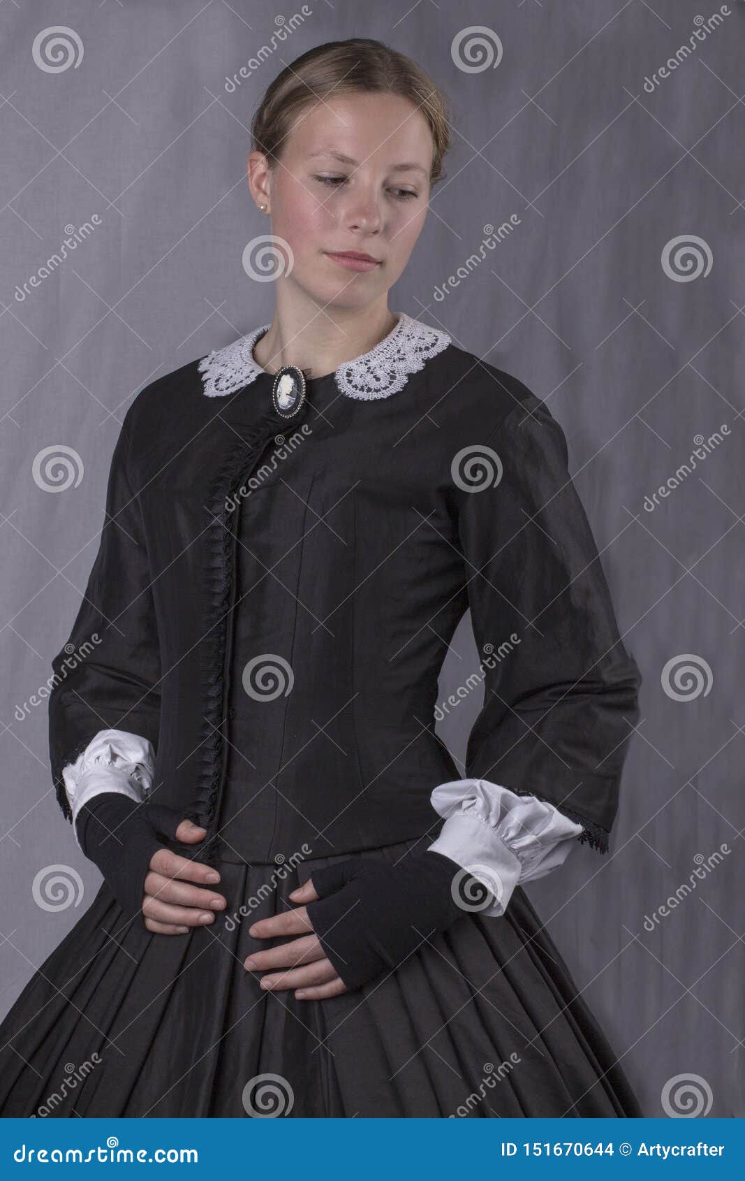 victorian woman in black bodice and skirt