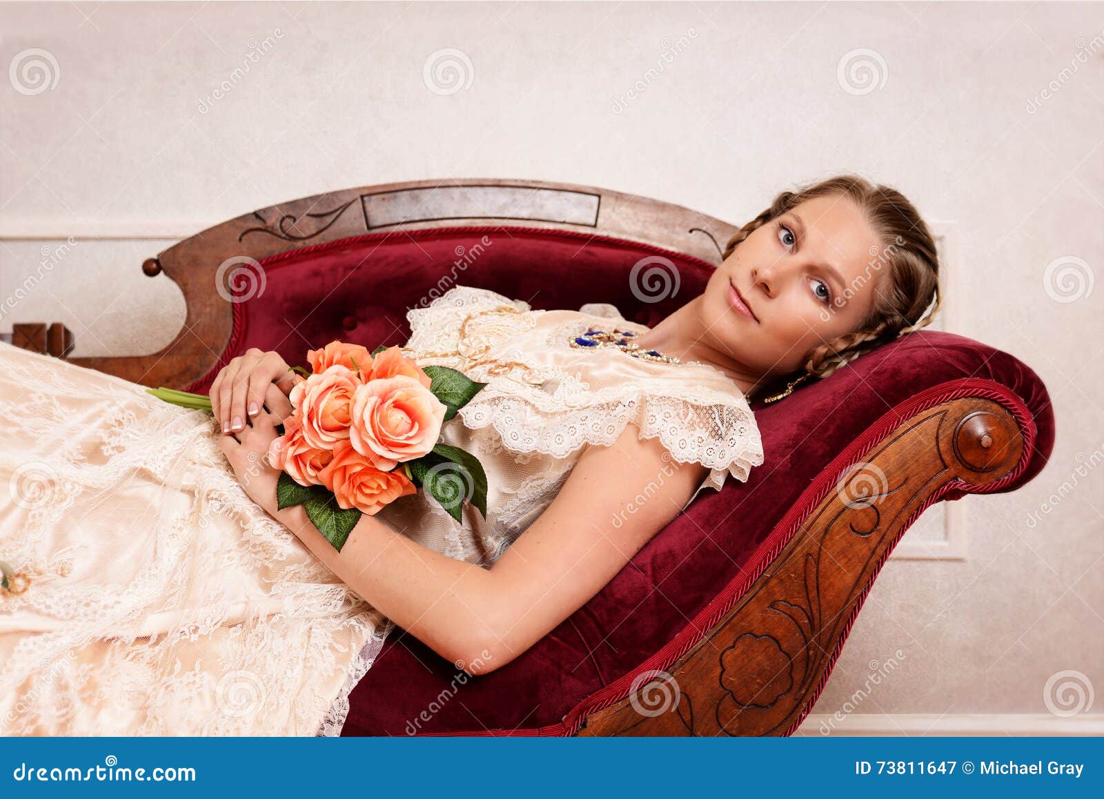 Victorian Woman With Flowers On Fainting Couch Stock Image Image