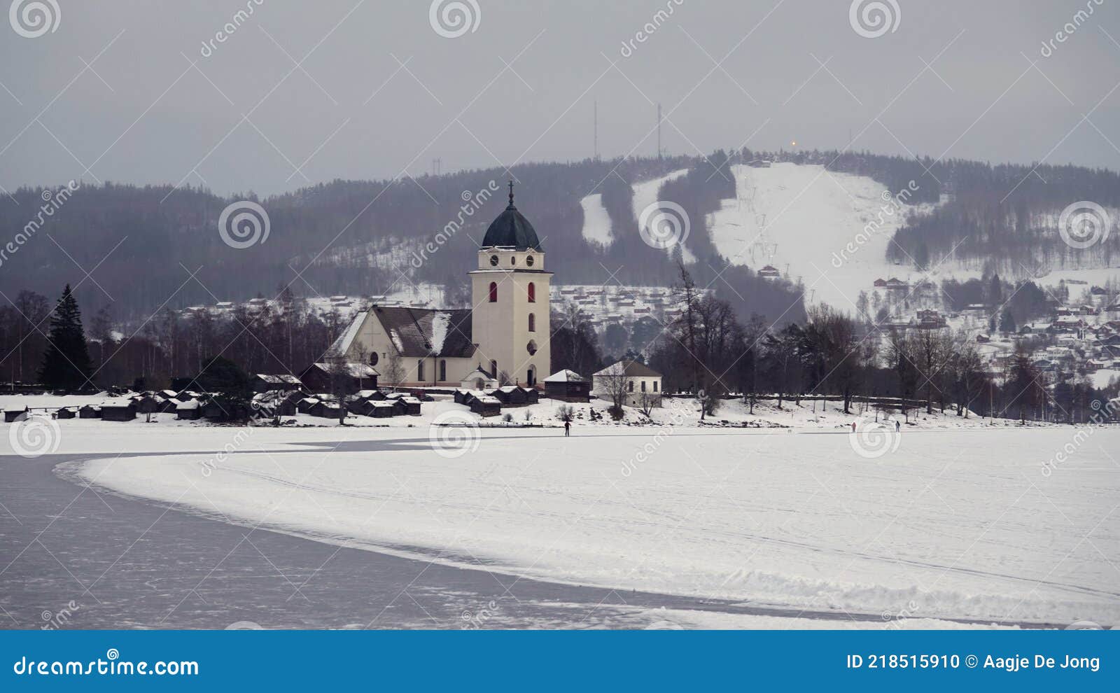 rattvik kyrka on frozen lake siljan in dalarna in sweden