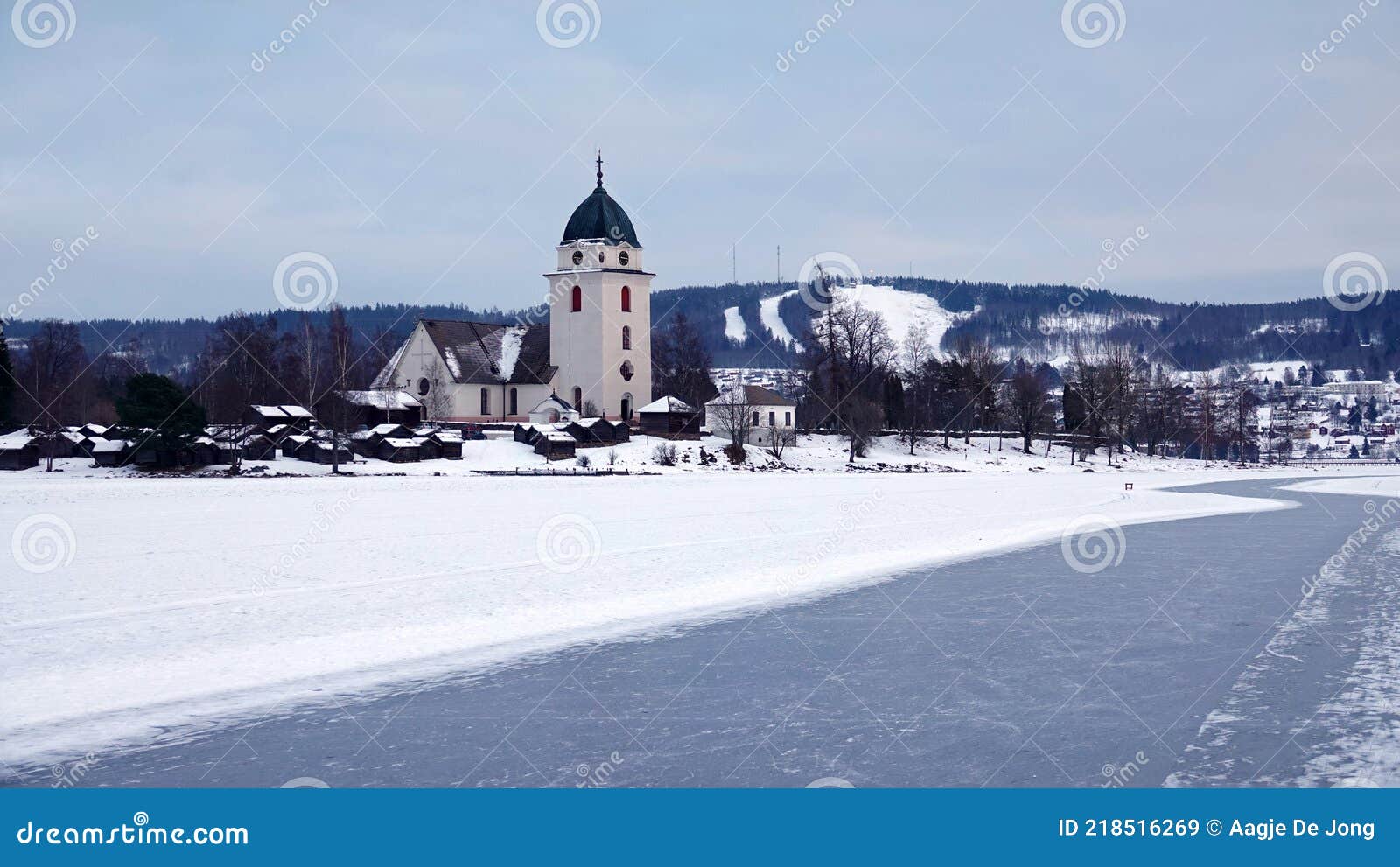 rattvik kyrka on frozen lake siljan in dalarna in sweden