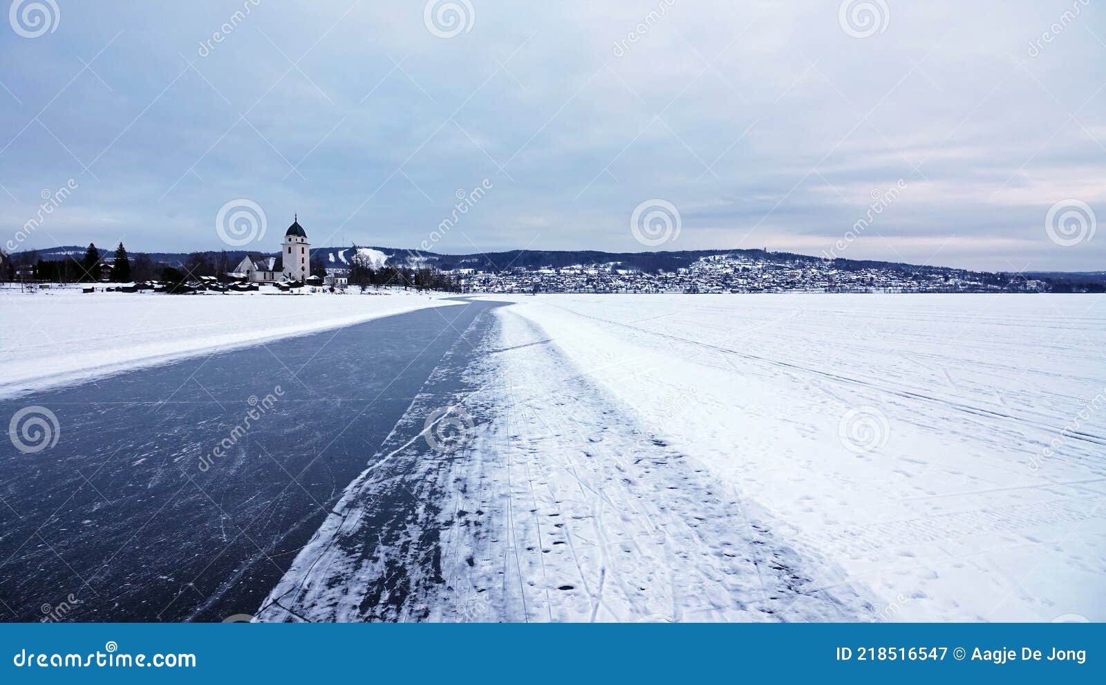 rattvik kyrka on frozen lake siljan in dalarna in sweden