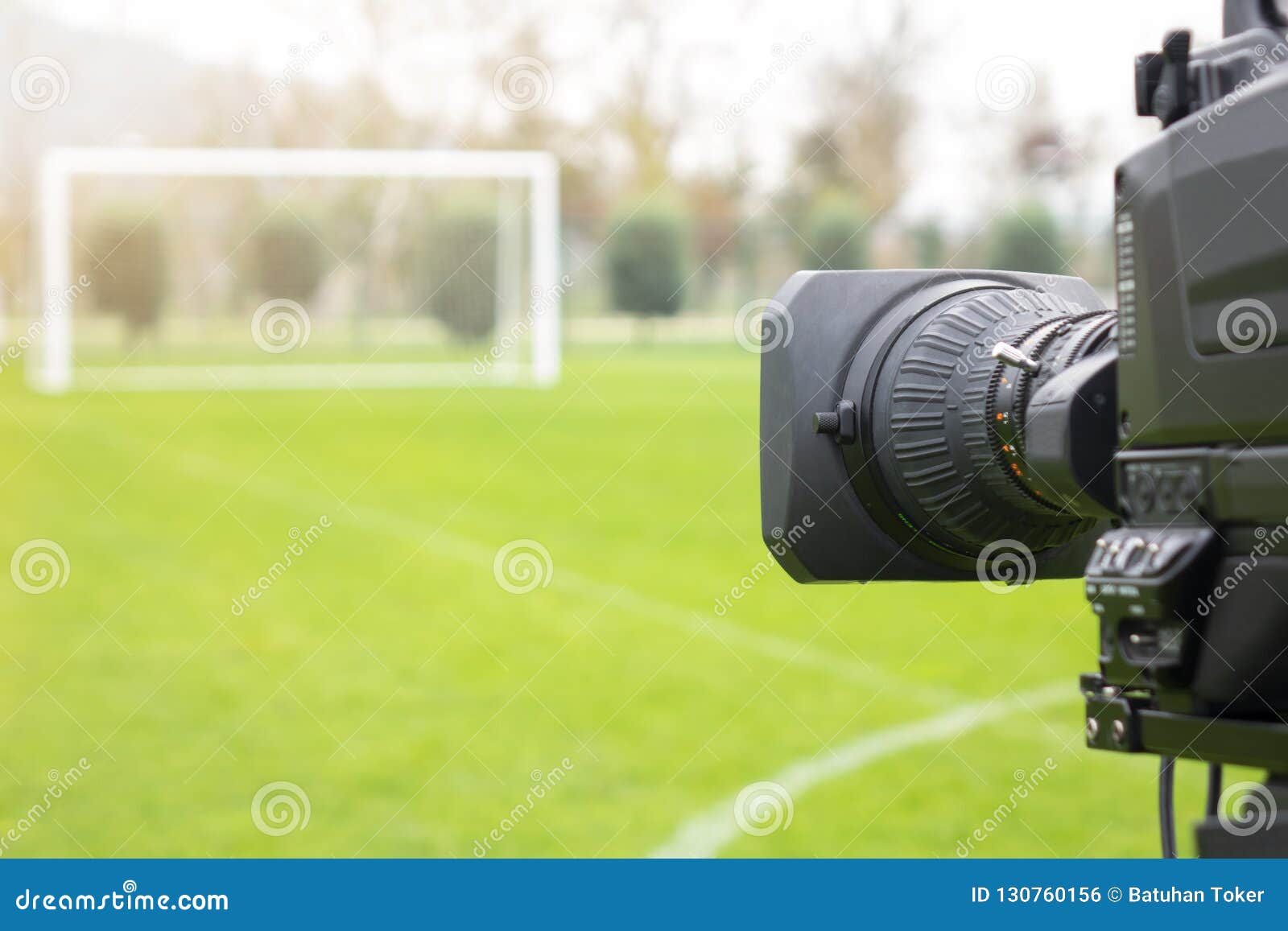 video camera put on the back of football goal for broadcast on tv sport channel. football program can `t editing in studio