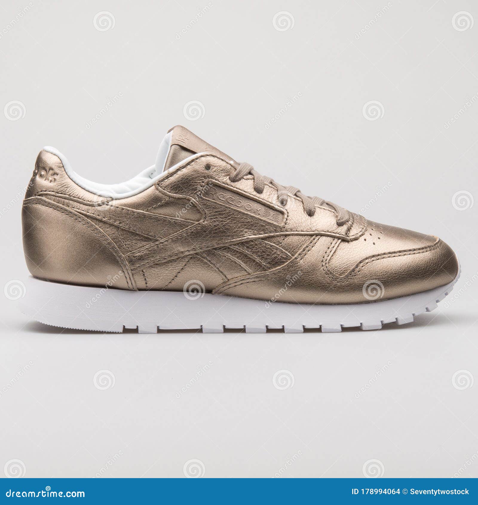 Classic Leather Melted Metal Grey and Gold Sneaker Editorial Stock Image - Image of fitness, accessories: 178994064