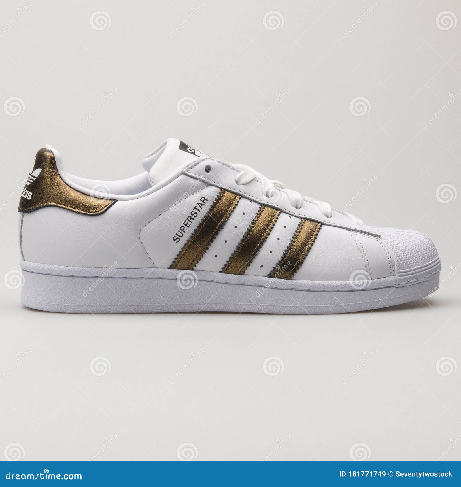 Adidas Superstar White And Gold Sneaker Editorial Stock Image - Image ...