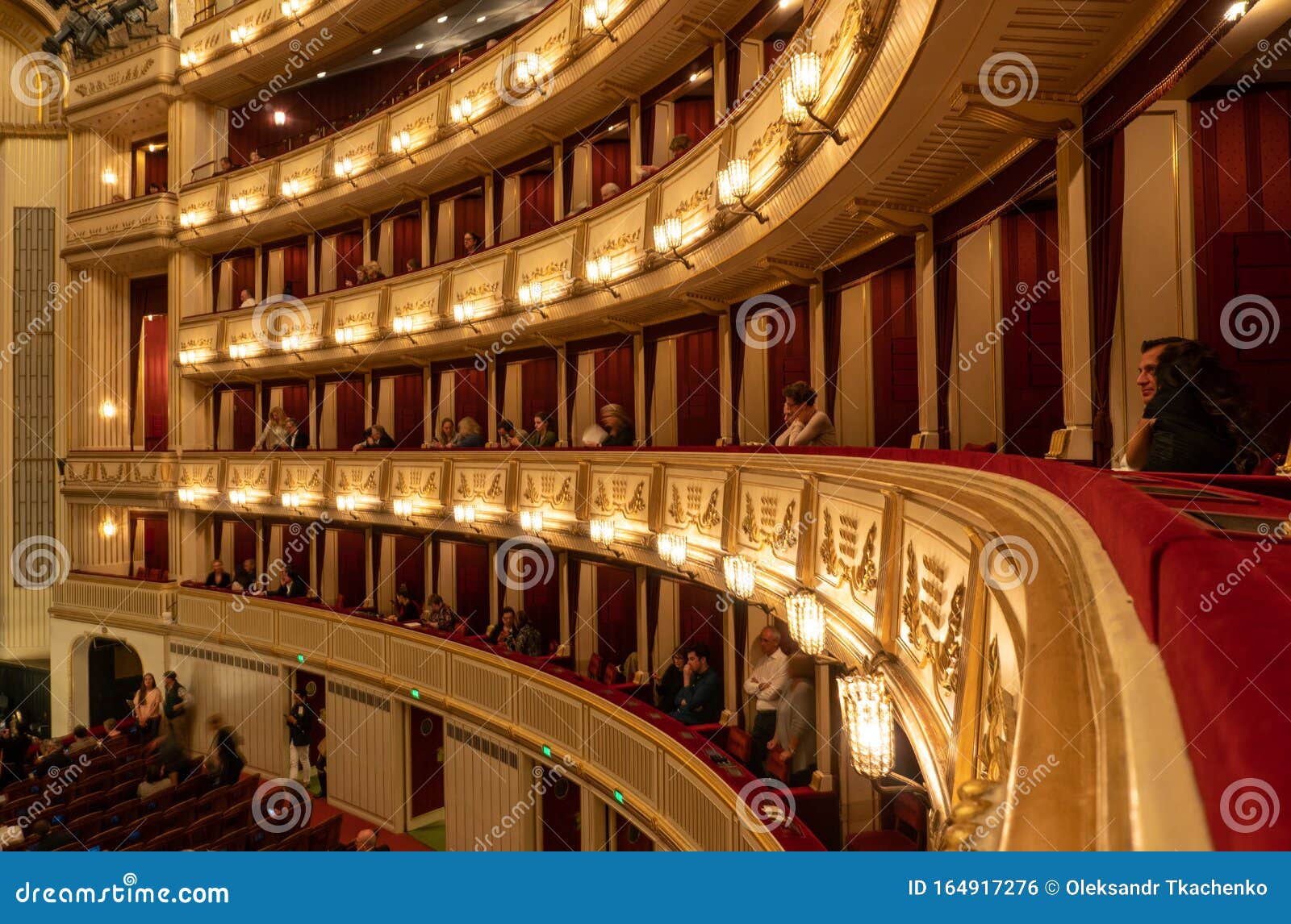 People watching open air live Opera outside the State Opera House in  Karajan Platz Vienna in Austria Stock Photo - Alamy