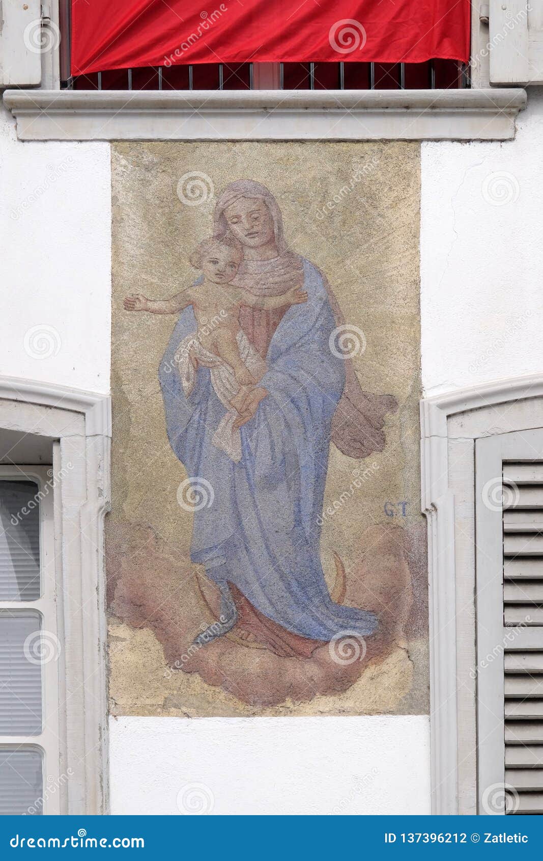 Virgin Mary with baby Jesus, beautiful painted facade in Lucerne, Switzerland