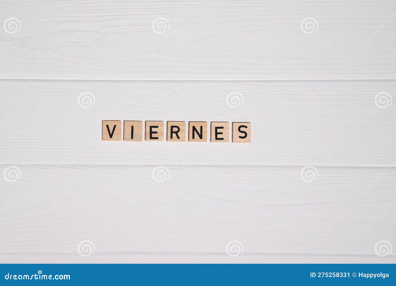 viernes week day name on white wooden background