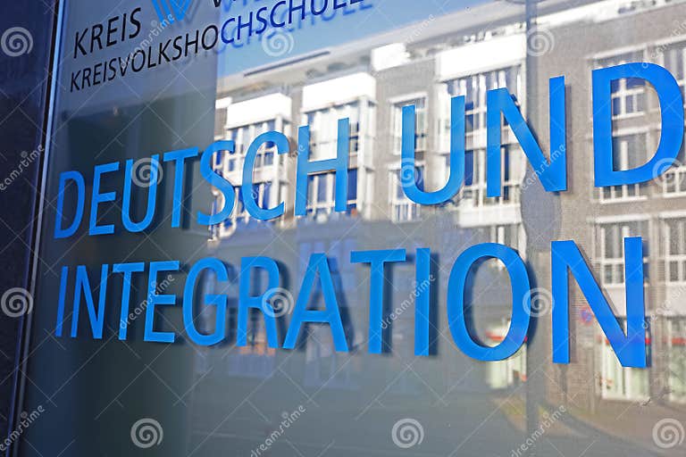 Sign with German and Integration Courses for Asylum Seekers at Adult Education Center School VHS