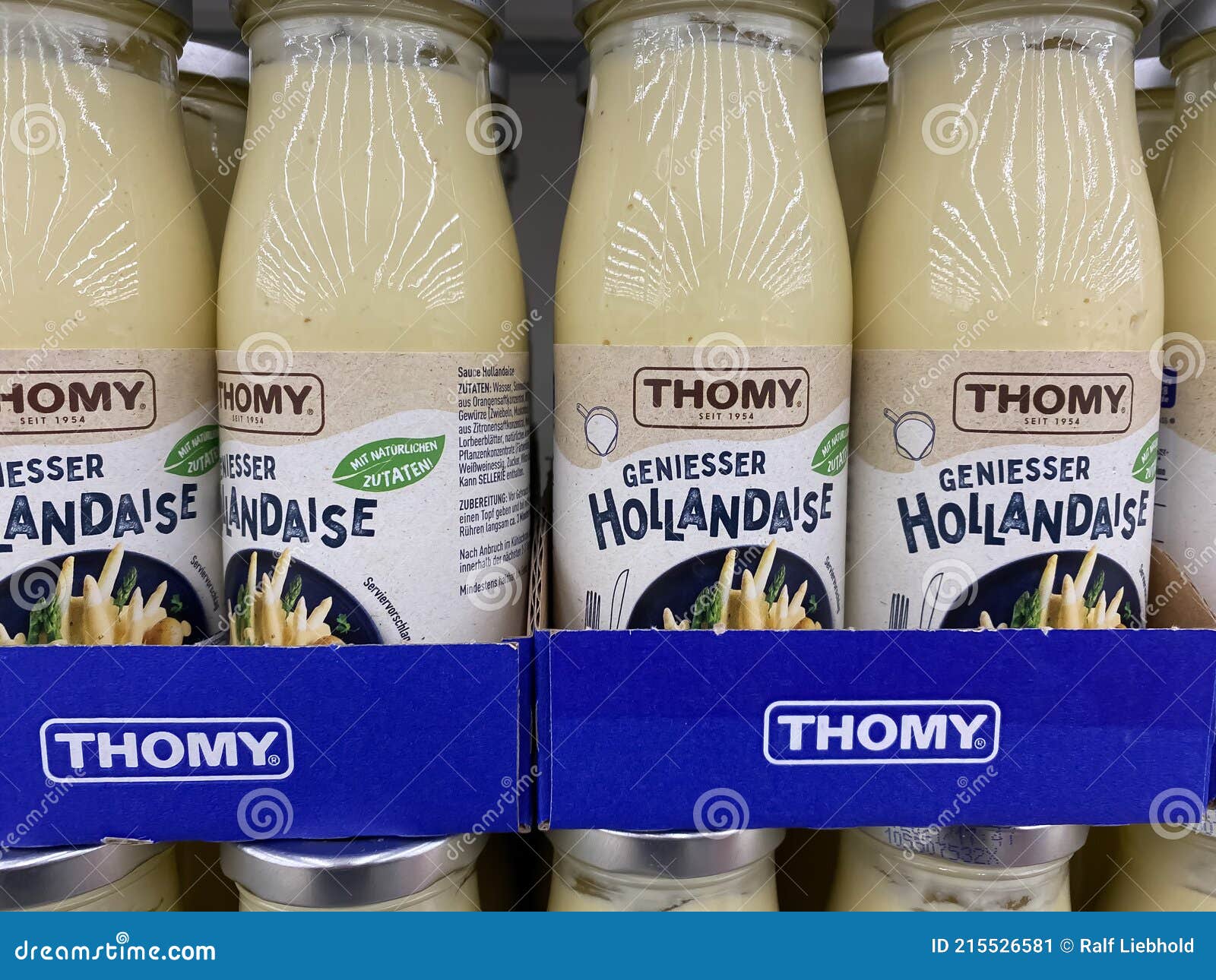 Closeup of Sauce Hollondaise Bottles with Thomy Logo Lettering in