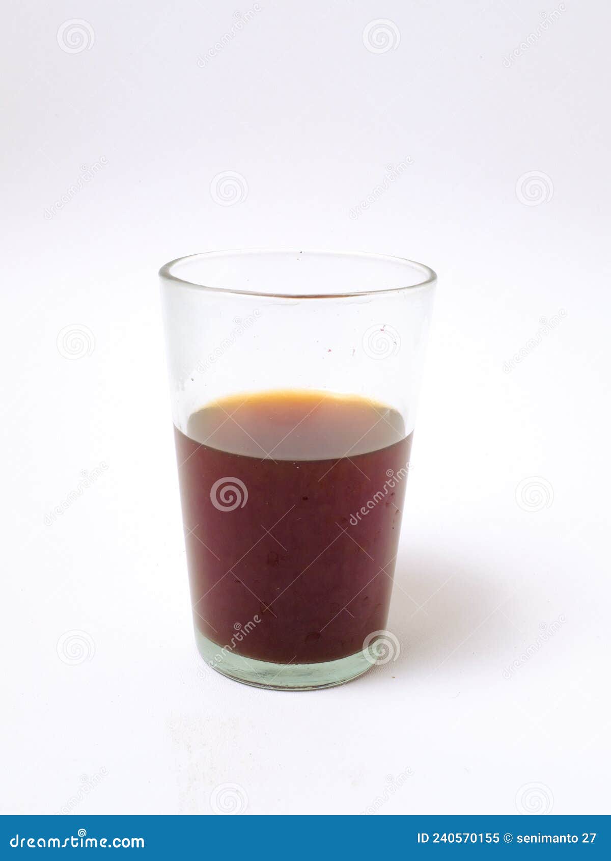 Vietnamese Coffee in Glass Cups and Traditional Metal Coffee Maker Phin