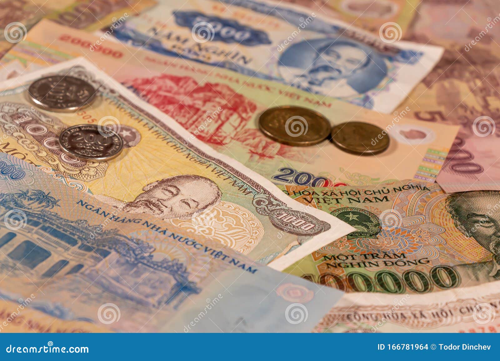 Vietnamese Dong VND Banknotes And Coins Vietnam VN Stock Photo vietnamese-dong-vnd-banknotes-and-coins-vietnam-vn-stock-photo