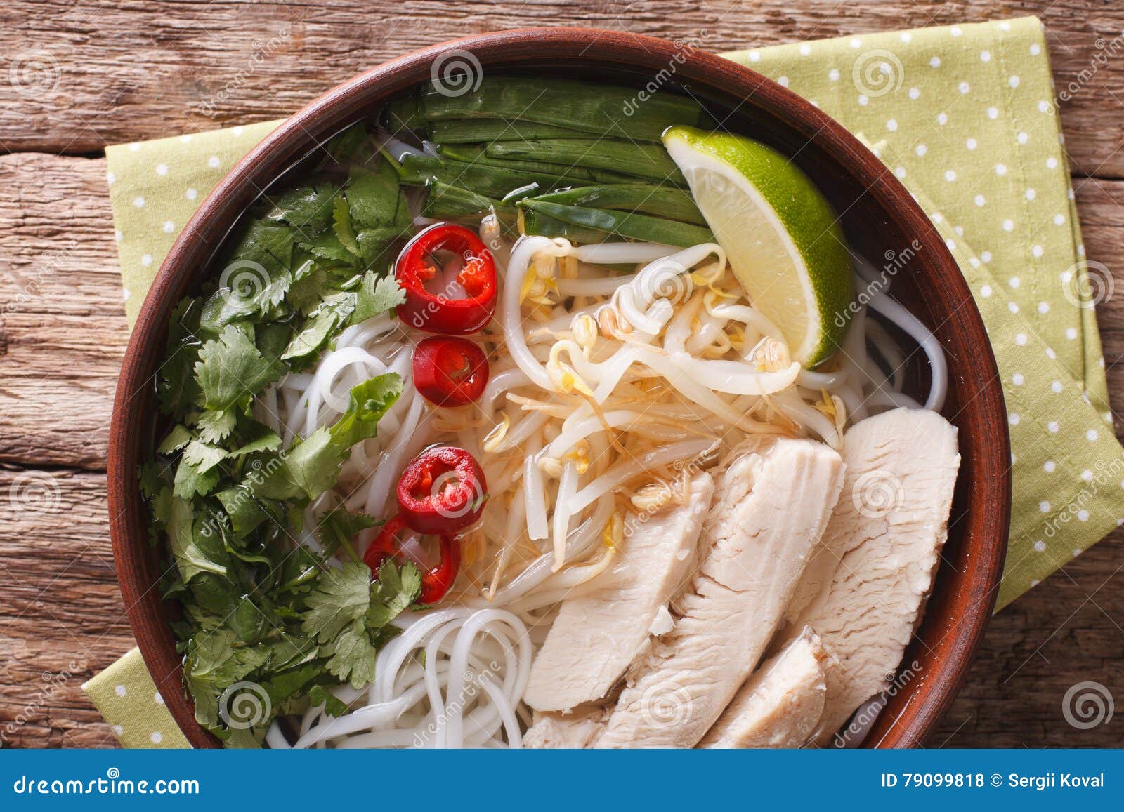 vietnamese food: spicy soup pho ga with chicken, rice noodles an