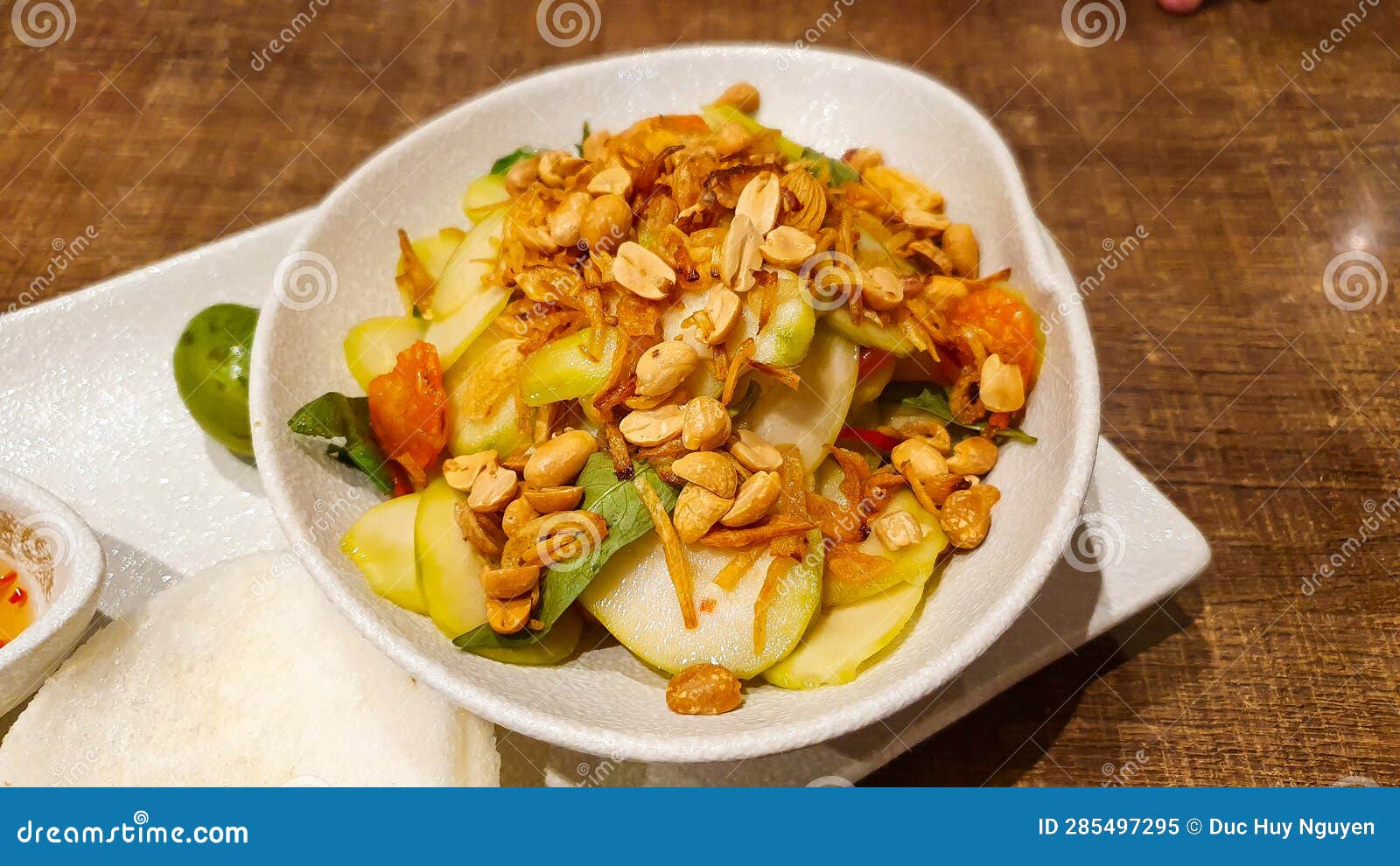 Vietnamese Green Mango Salad with Peanuts and Fried Onion. Stock Image