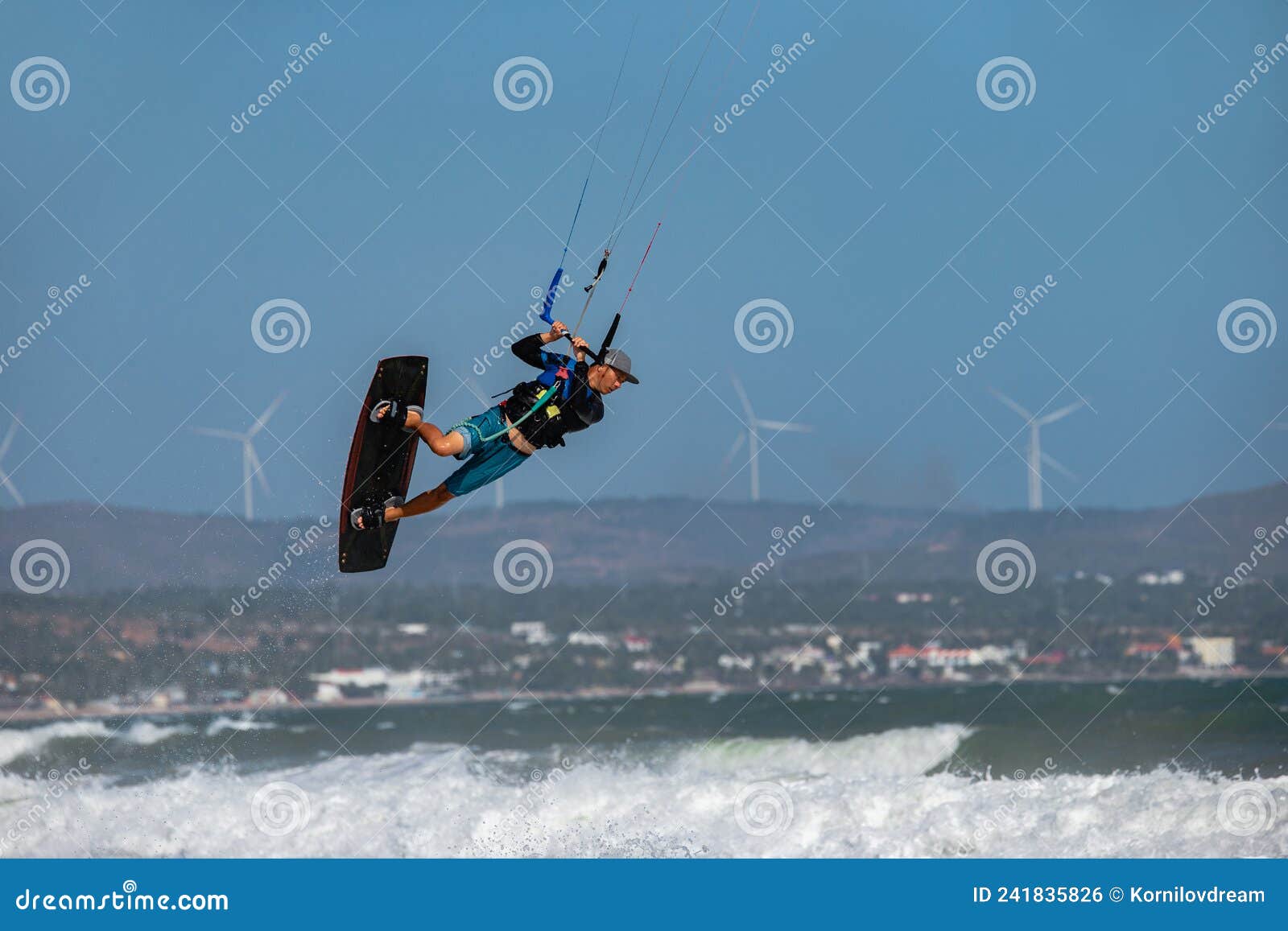 Vietnamese Kite Surfer Jumps with Kiteboard Stock Photo Image of